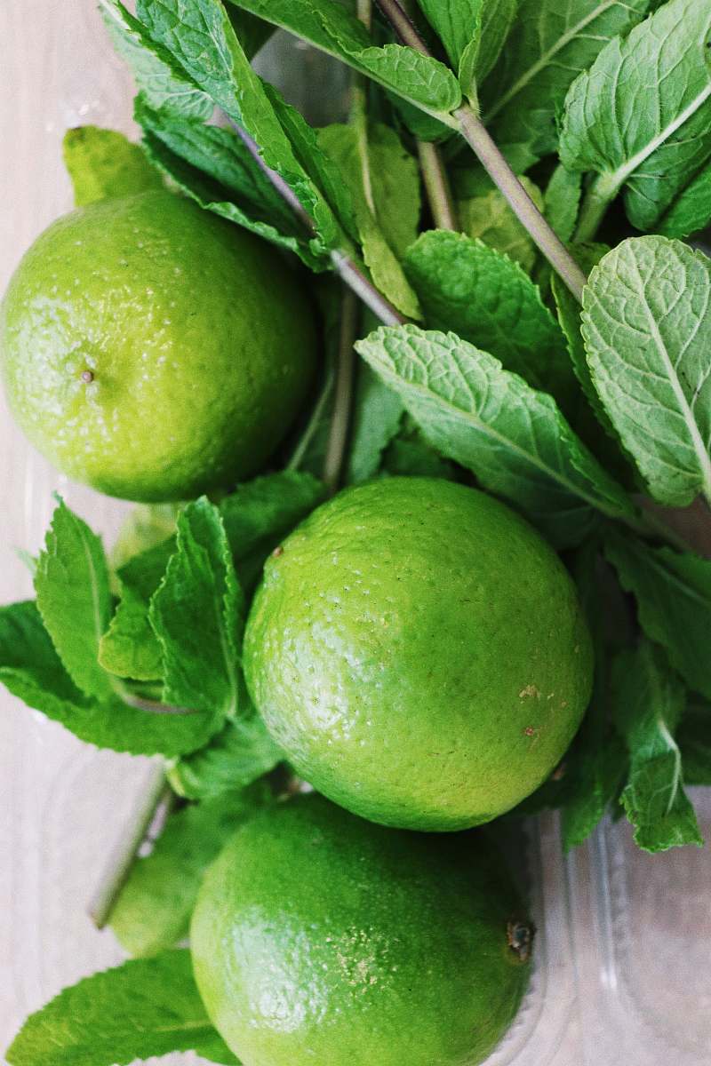 citrus fruit three round green fruits lime